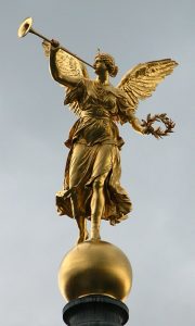 Sculpture of Goddess Pheme/Fama on the roof of the Dresden University of Visual Arts. Sculpted in bronze by Robert Henze.